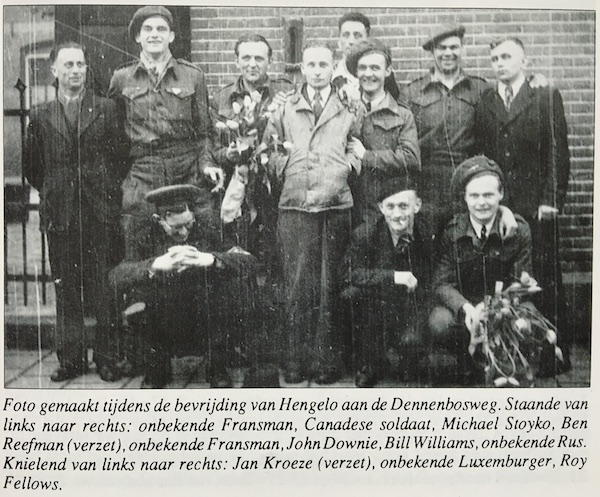 Photo taken during the liberation of Hengelo at the Dennenbosweg. Standing l. to r.- unknown French man, Canadian soldier, Michael Stoyko, Ben Reefman (resistance), unknown French man, John Downie, Bill Williams, unknown Russian. Kneeling l. to r.- Jan Kroeze (resistance), unknown Luxumburger, Roy Fellows. Courtesy of M. Klaassen.